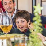 boy-eating-festive-table