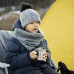 close-up-child-camping-with-his-parents