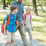 father-walking-kids-to-school.jpg