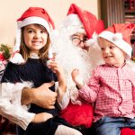 Christmas scene. children with santa claus
